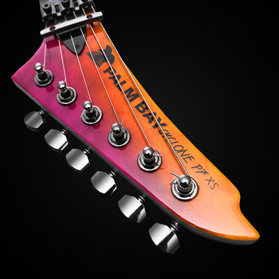 Cyclone P7 XS Yellow/Magenta headstock, top angle